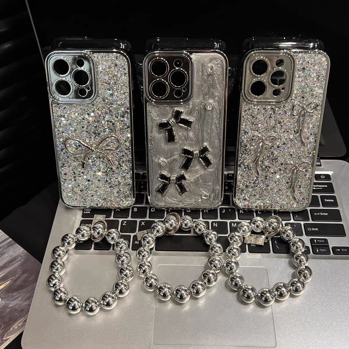 iPhone 16 Electroplated Silver Glitter Case with Pearl Hand Chain